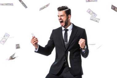 düşen dolar banknotlar yakın Smartphone ile heyecanlı işadamı beyaz üzerinde Izole