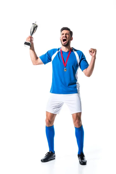 Opgewonden Voetbalspeler Met Trofee Beker Medaille Geïsoleerd Wit — Stockfoto