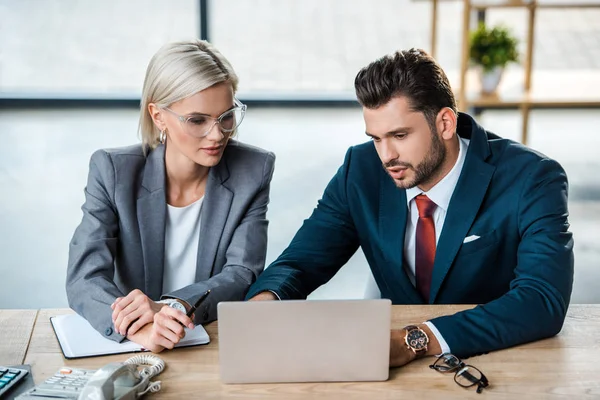 Handsome Businessman Blonde Businesswoman Glasses Looking Laptop Office — Stock Photo, Image