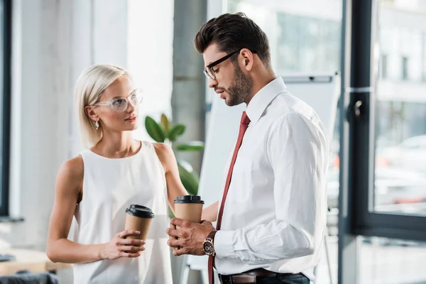 Attractive Blonde Businesswoman Looking Upset Man Glasses Holding Paper Cup — Stock Photo, Image