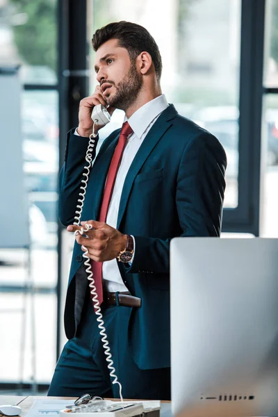 Selective Focus Handsome Bearded Businessman Talking Retro Phone Office — Stock Photo, Image