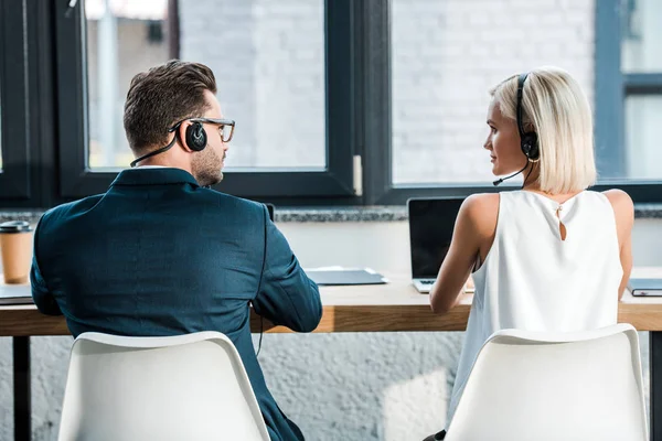 Operators Headsets Looking Each Other While Sitting Office — Stock Photo, Image