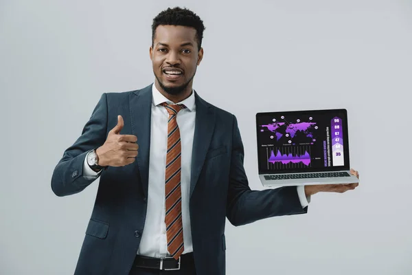 Cheerful African American Man Holding Laptop Charts Graphs Screen Showing — Stock Photo, Image