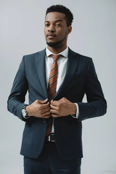 African American Man Touching Suit Isolated Grey — Stock Photo, Image