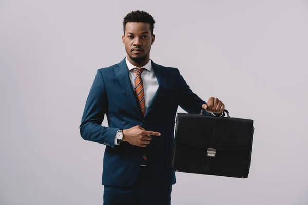 African American Man Pointing Finger Briefcase Isolated Grey — Stock Photo, Image