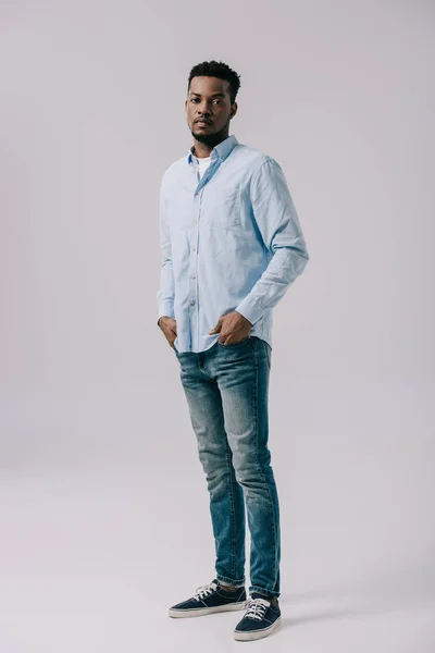 Handsome African American Man Standing Hands Pockets Grey — Stock Photo, Image