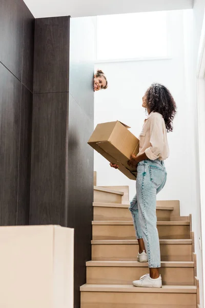 Full Length View Woman Walking Upstairs Holding Box While Kid — Stock Photo, Image