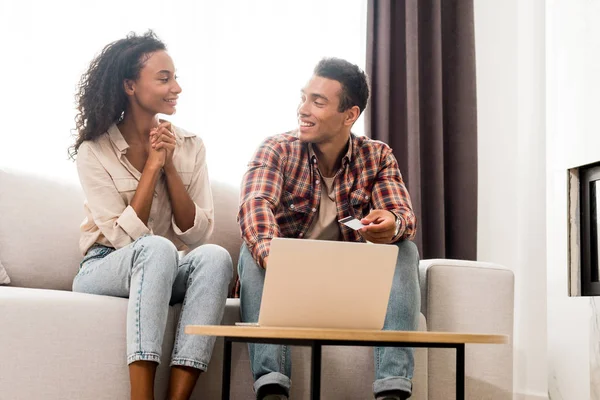 Handsome Man African American Woman Looking Each Other Sitting Sofa — Stock Photo, Image