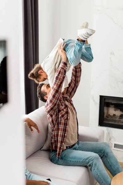 Selective Focus Woman Sitting African American Dad While Man Holding — Stock Photo, Image