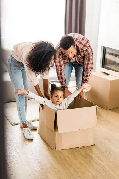 Selective Focus African American Parents Playing Daughter Moving Box Kid — Stock Photo, Image