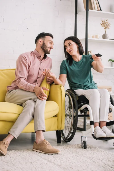 Attractive Disabled Woman Talking Handsome Boyfriend While Watching Together Home — Stock Photo, Image