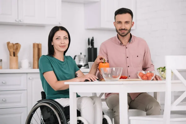 Attractive Disabled Woman Boyfriend Smiling Camera While Sitting Kitchen Table — Stock Photo, Image