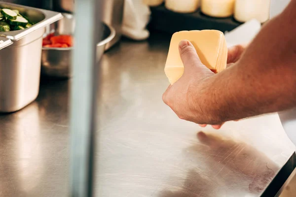 Cropped View Cook Holding Cheese Workplace — Stock Photo, Image