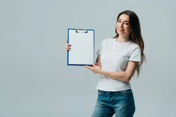 Happy Beautiful Girl White Shirt Holding Empty Clipboard Isolated Grey — Stock Photo, Image