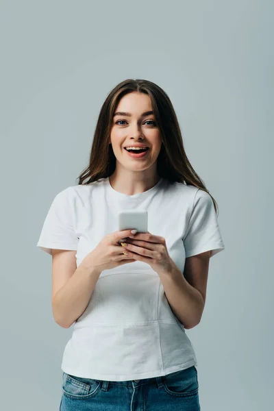 Excited Beautiful Girl White Shirt Using Smartphone Isolated Grey — Stock Photo, Image