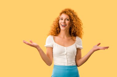 happy woman with shrug gesture, isolated on yellow clipart