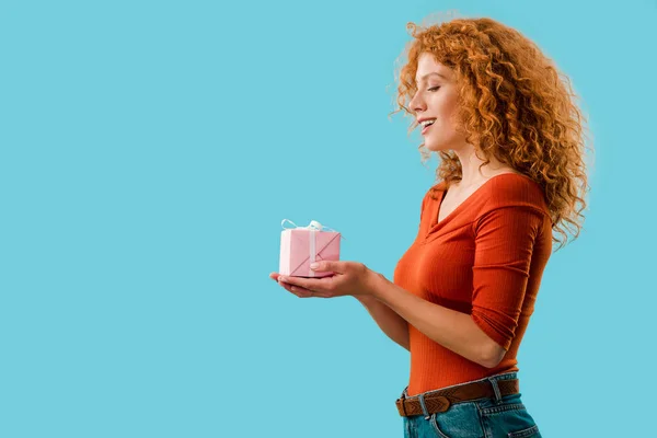 Attractive Woman Holding Gift Box Isolated Blue — Stock Photo, Image