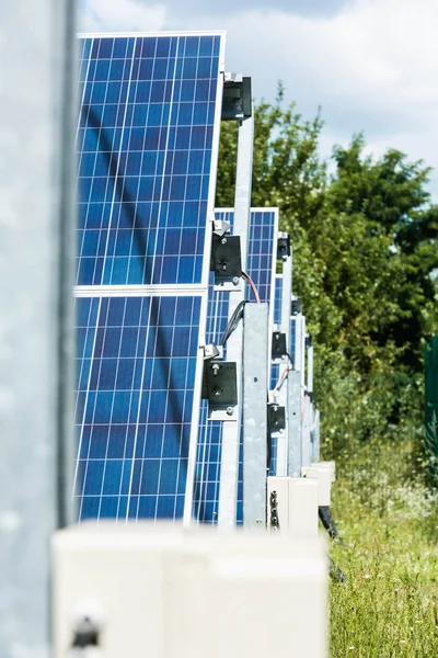 Selective Focus Blue Solar Energy Batteries Green Trees — Stock Photo, Image