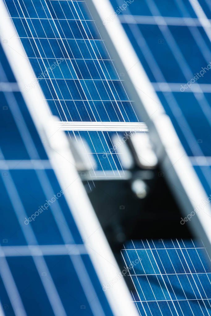 selective focus of blue solar energy batteries with copy space 