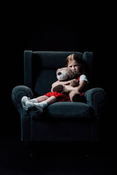 Depressed Scared Child Sitting Armchair Hugging Teddy Bear Isolated Black — Stock Photo, Image