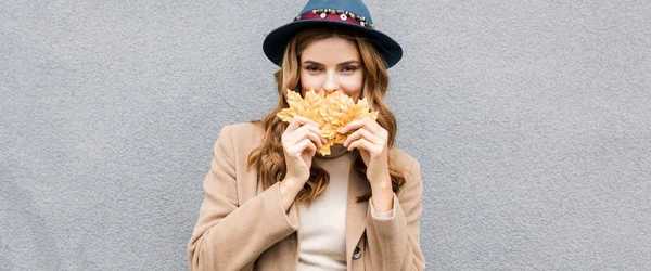 Panoramic Shot Attractive Woman Blue Hat Looking Camera Holding Yellow — Stock Photo, Image