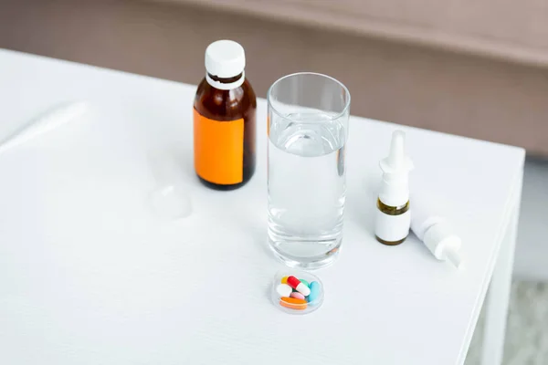 High Angle View Nose Drops Cough Syrup Pills Glass Water — Stock Photo, Image