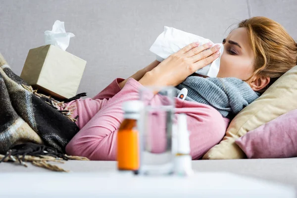 Selective focus of attractive and ill woman sneezing and using napkin — Stock Image Selective Focus Attractive Ill Woman Sneezing Using Napkin Stock Picture
