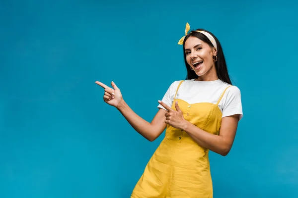 Happy Young Woman Headband Pointing Fingers Isolated Blue — Stock Photo, Image