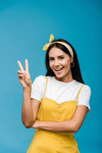 Happy Young Woman Headband Showing Peace Sign Isolated Blue — Stock Photo, Image