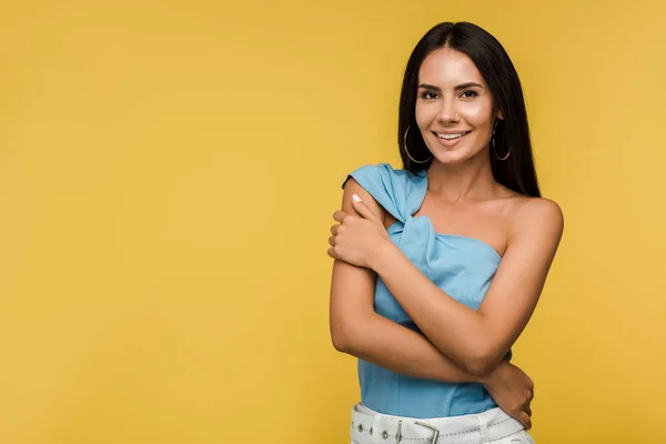 Happy Young Woman Crossed Arms Looking Camera Isolated Orange — Stock Photo, Image