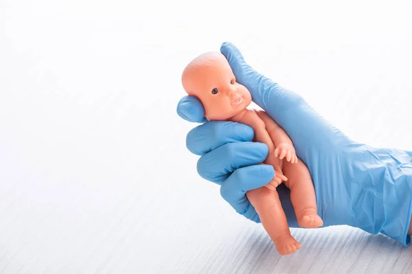 Cropped View Doctor Blue Glove Holding Baby Doll — Stock Photo, Image