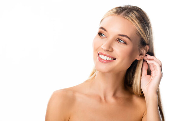 naked smiling blonde woman with white teeth looking away isolated on white