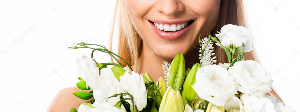 cropped view of smiling woman with flowers isolated on white