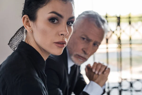 Selective Focus Beautiful Sad Woman Looking Camera Senior Man — Stock Photo, Image