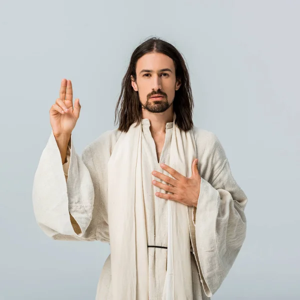 Hombre Guapo Rezando Con Mano Pecho Aislado Gris — Foto de Stock