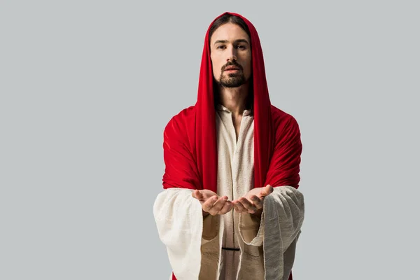 Religieuze Man Met Gecupt Handen Kijken Naar Camera Geïsoleerd Grijs — Stockfoto