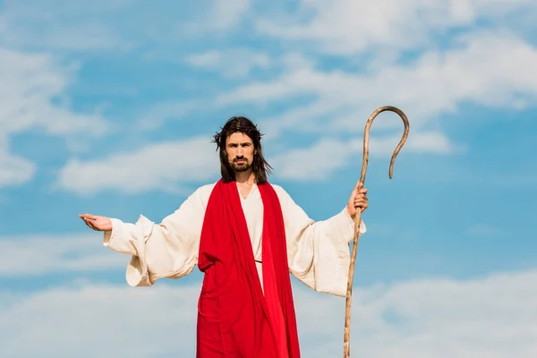 Handsome Man Wreath Outstretched Hands Holding Cane — Stock Photo, Image