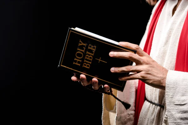 Cropped View Man Holding Book Holy Bible Letters Isolated Black — Stock Photo, Image