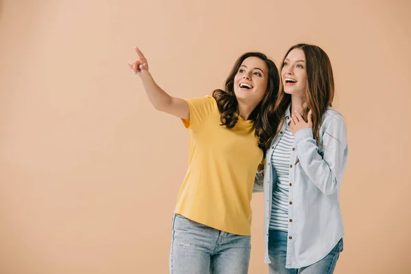 Attractive Smiling Friends Pointing Finger Isolated Beige — Stock Photo, Image