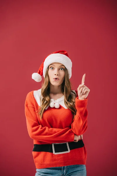 Attractive Woman Santa Hat Sweater Showing Idea Gesture Isolated Red — Stock Photo, Image