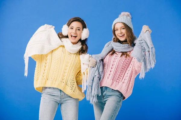 Attractive Smiling Women Sweaters Scarves Looking Camera Isolated Blue — Stock Photo, Image