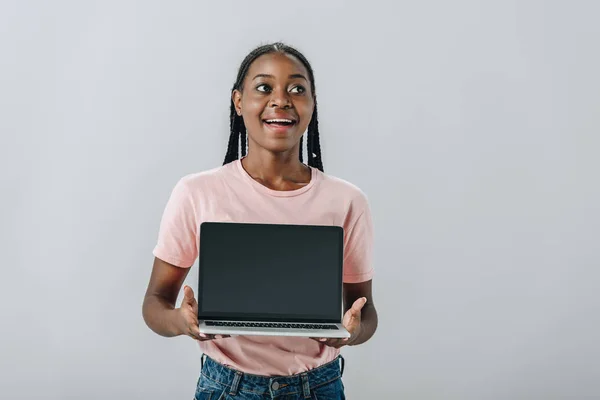 Excited African American Woman Holding Laptop Blank Screen Looking Away — Stock Photo, Image