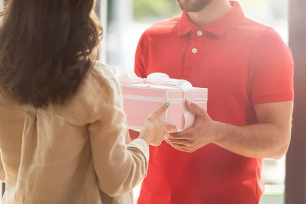 Cropped View Delivery Man Giving Pink Present Young Woman — Stock Photo, Image