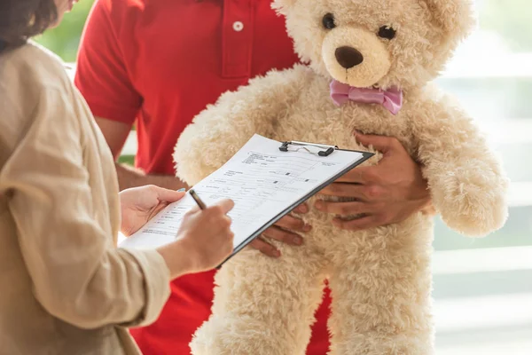 Cropped View Girl Signing Paper Clipboard Man Teddy Bear — Stock Photo, Image