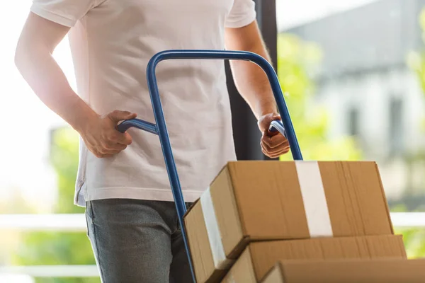 Cropped View Delivery Man Holding Delivery Cart Carton Boxes — Stock Photo, Image
