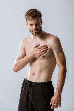 shirtless bearded man with chest pain isolated on grey clipart