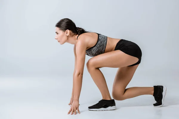 Side View Brunette Sportswoman Training Grey — Stock Photo, Image