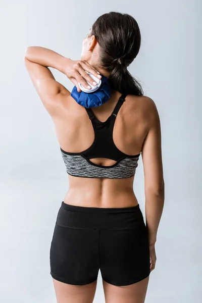 Back View Sportswoman Using Ice Neck Isolated Grey — Stock Photo, Image