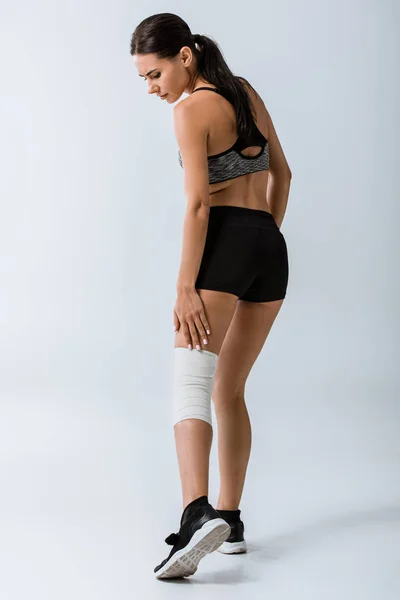 Full Length View Sportswoman Elastic Bandage Knee Grey — Stock Photo, Image