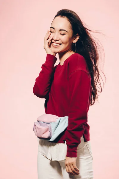 Attractive Asian Woman Closed Eyes Red Sweater Smiling Isolated Pink — Stock Photo, Image